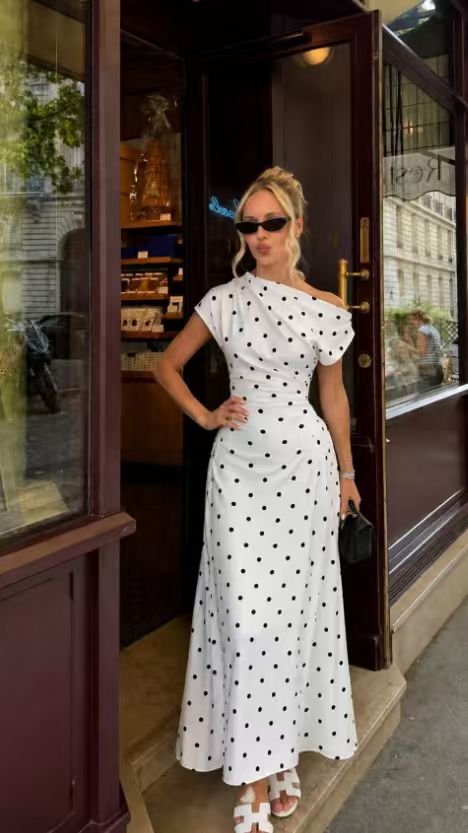 d87edb93c3bb9c35cfa8ac6d18b3cb23.jpg Women's dress with polka dot pattern and boat neckline - Image 1